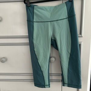Woman’s lululemon mix of green short yoga leggings